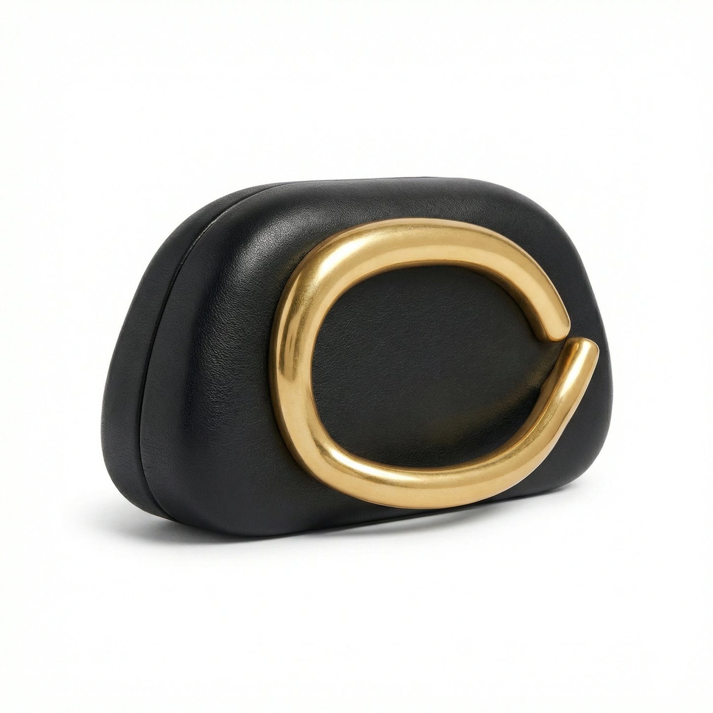 TKN Moonstone cream clutch bag featuring a large organic gold metal ring detail and soft rounded shape