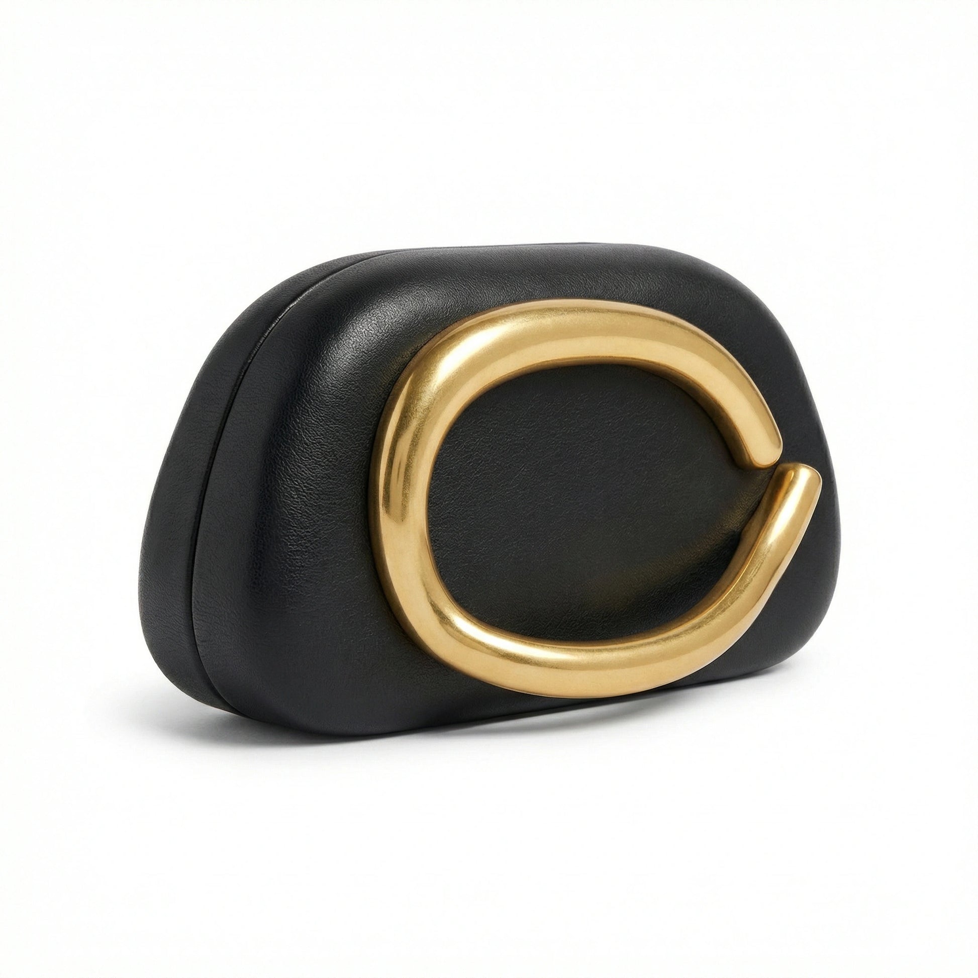 TKN Moonstone cream clutch bag featuring a large organic gold metal ring detail and soft rounded shape