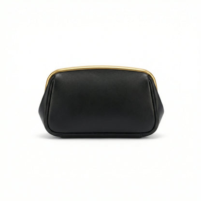 Moonstone — A compact clutch with a rounded shape and oversized ring detail.