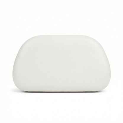 Moonstone — A compact clutch with a rounded shape and oversized ring detail.