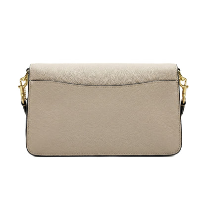 Graphite — A structured shoulder bag with a flap, graphic print and front clasp detail.
