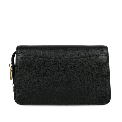 Graphite — A structured shoulder bag with a flap, graphic print and front clasp detail.