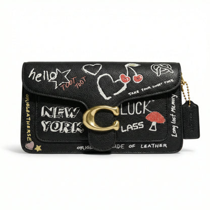 Graphite — A structured shoulder bag with a flap, graphic print and front clasp detail.