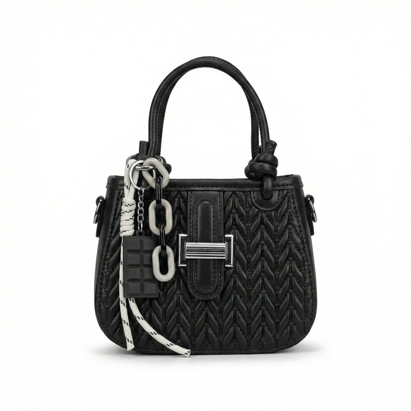 TKN Basalt compact boxy crossbody bag featuring wide webbing strap and structured design