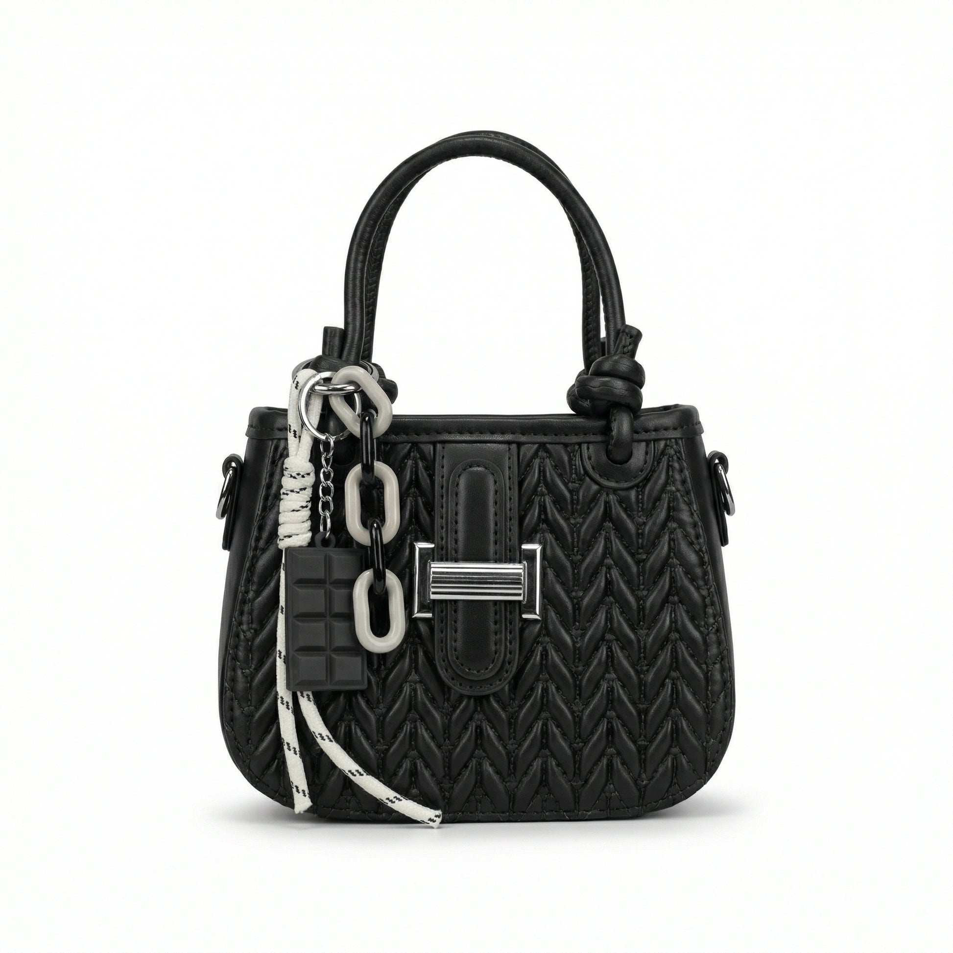 TKN Basalt compact boxy crossbody bag featuring wide webbing strap and structured design