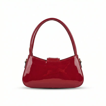 Jet — A curved shoulder bag with a smooth finish and small metal detail.