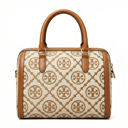 Legacy — A structured Boston bag with rounded top handles and an all-over pattern.