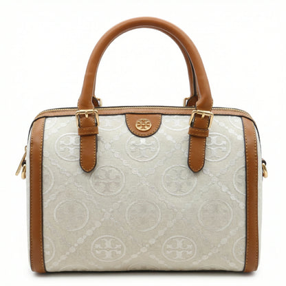 Legacy — A structured Boston bag with rounded top handles and an all-over pattern.