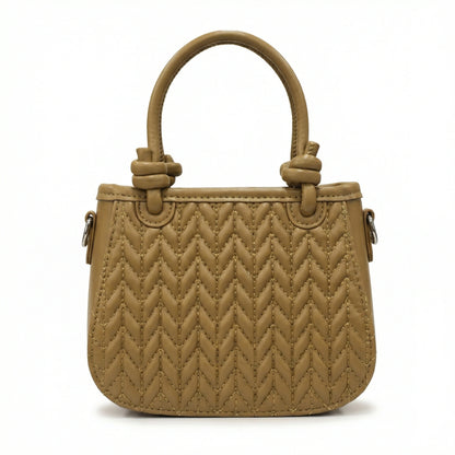 Basalt — A compact crossbody bag with a top handle and wide webbing strap.