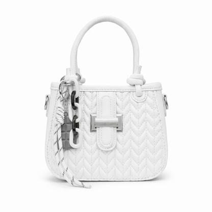 Basalt — A compact crossbody bag with a top handle and wide webbing strap.