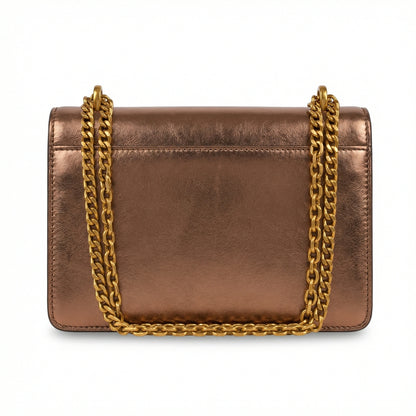 Quartz — A compact flap-style crossbody bag with a chain strap and metal accent.
