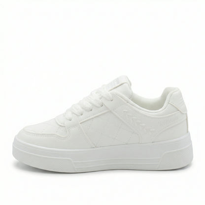 Drift — A low-profile lace-up sneaker with stitched panel details.