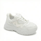 Momentum — A chunky lace-up sneaker with contrast panels.