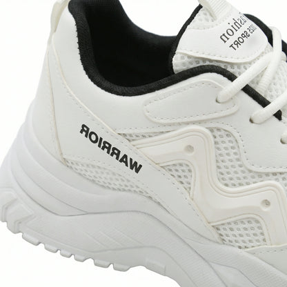 Momentum — A chunky lace-up sneaker with contrast panels.
