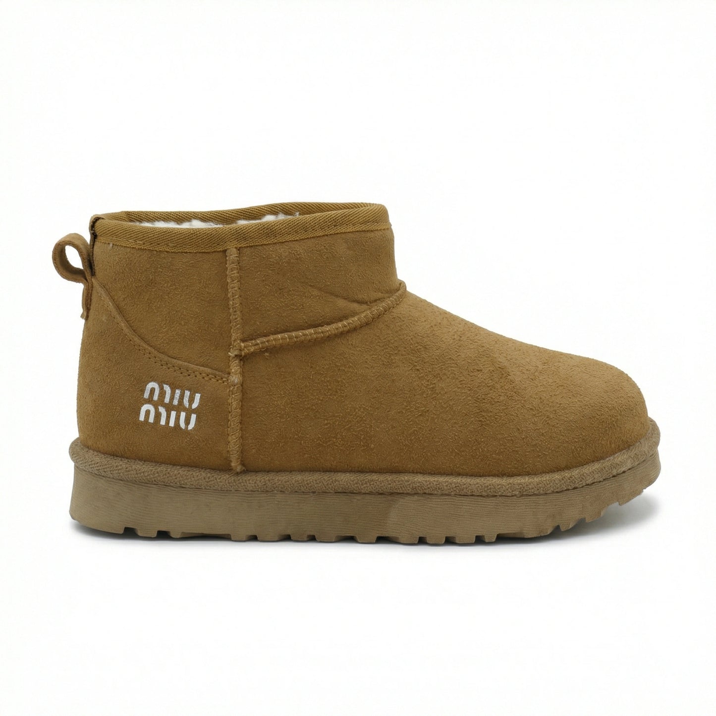 TKN Amber silhouette in Toasted Camel featuring a soft suede exterior and signature white shearling lining