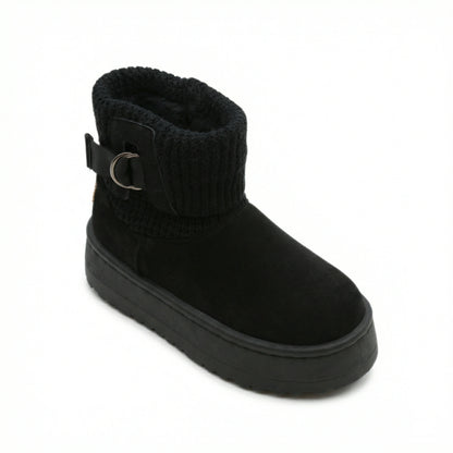 Velvet Touch — A boot with a knitted cuff, buckle detail and platform sole.