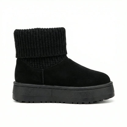 Velvet Touch — A boot with a knitted cuff, buckle detail and platform sole.