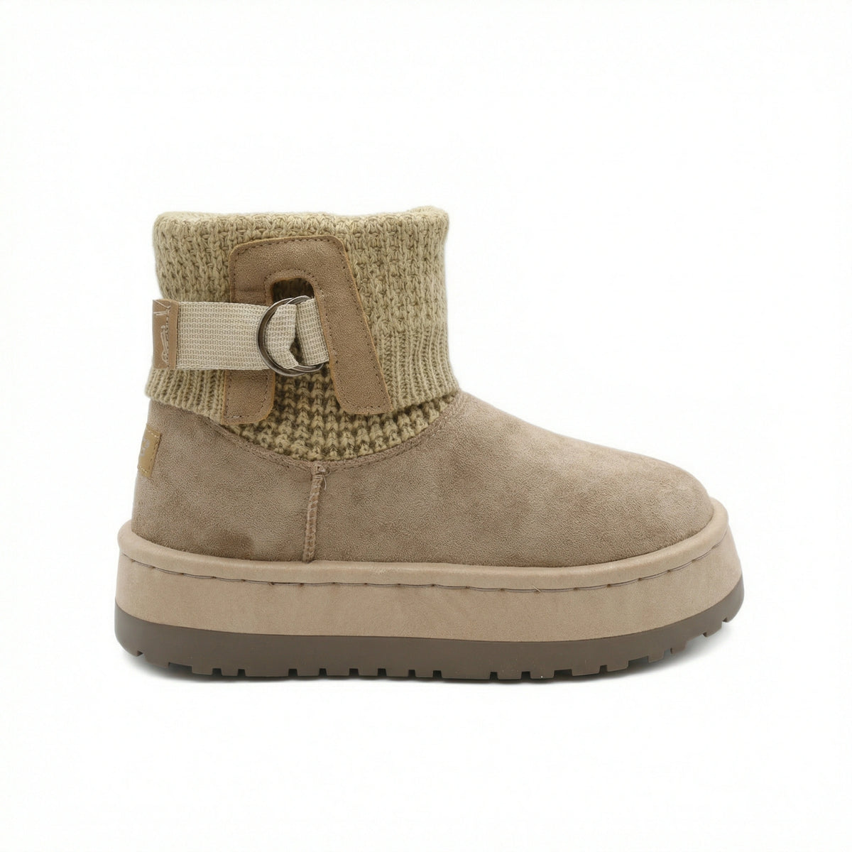 Velvet Touch — A boot with a knitted cuff, buckle detail and platform sole.