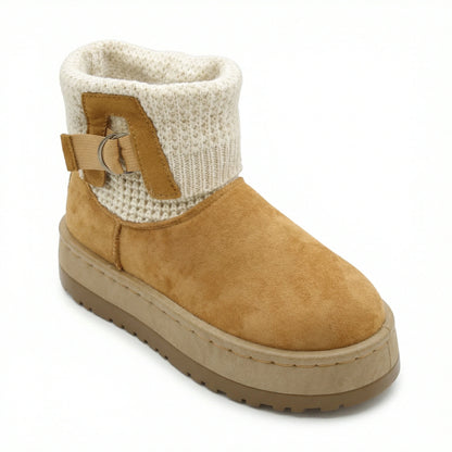 Velvet Touch — A boot with a knitted cuff, buckle detail and platform sole.