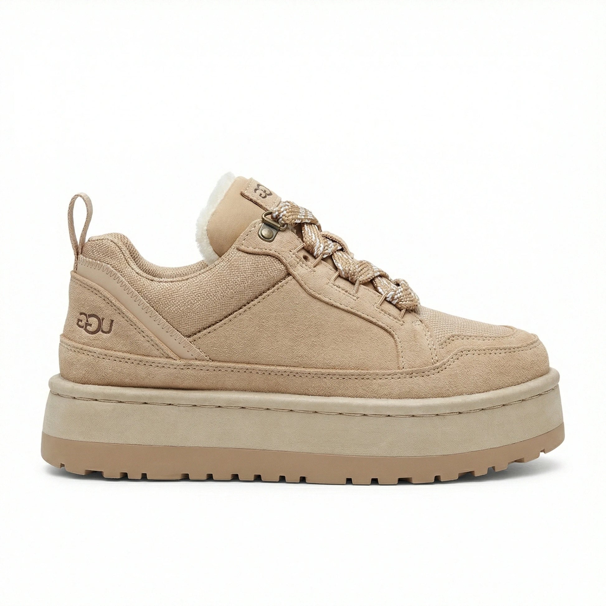 Close-up of TKN Dune Platform showing technical rope laces, metallic hardware, and plush shearling lining