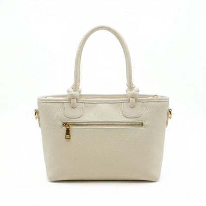 Onyx — A structured tote with knotted top handles and metal-tone details.