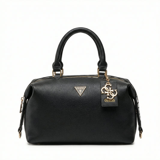 TKN Vogue Boston bag in pebbled black leather featuring bold white graphic logo print and gold-tone hardware.