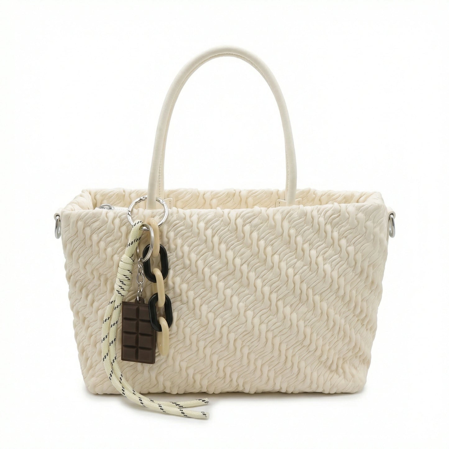 TKN Mousse cream handbag featuring textured ruched vegan leather, matte monochromatic chain charm, and dimensions of 24x16x9cm