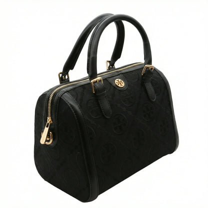 Legacy — A structured Boston bag with rounded top handles and an all-over pattern.