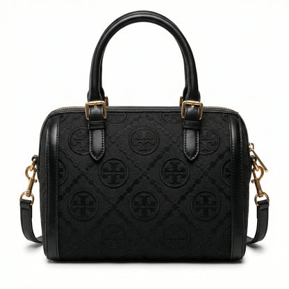 Legacy — A structured Boston bag with rounded top handles and an all-over pattern.