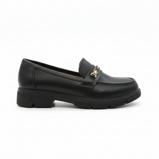 TKN Obsidian chunky loafer in smooth leather featuring gold-tone metal bit detail and lug sole.