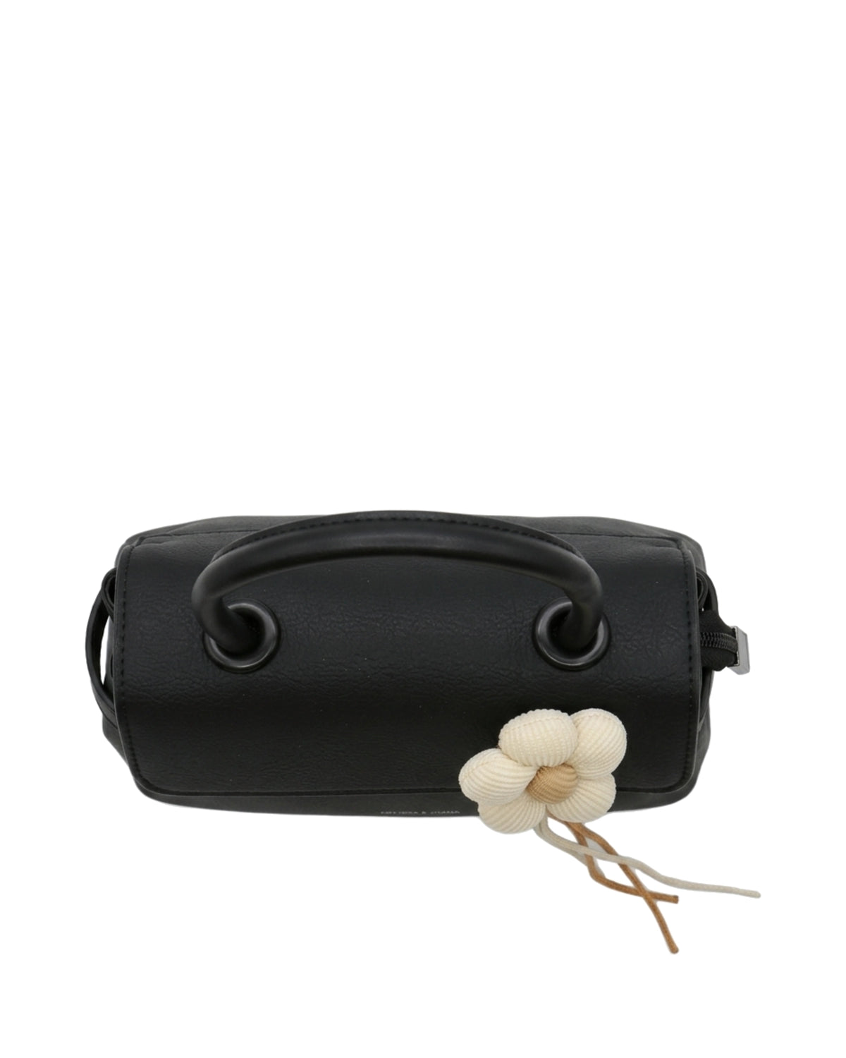 TKN Blossom — Black — flap-front body — overhead view.