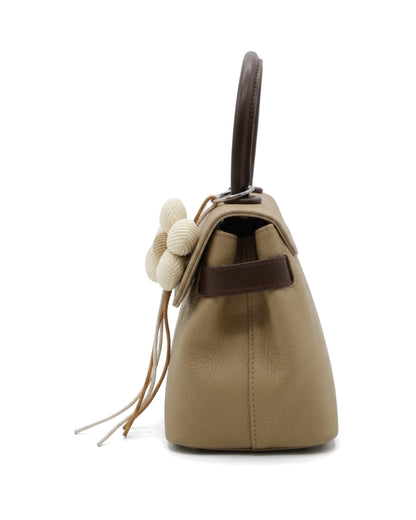 TKN Blossom — Taupe — flap-front body — side profile.