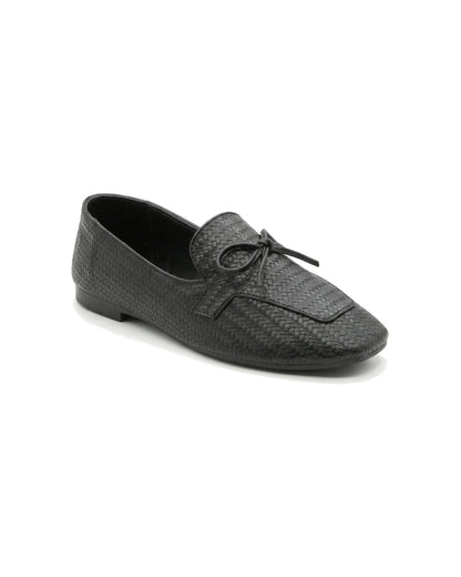 TKN Camille black woven-effect loafer with a tonal bow and piped vamp panel — front three-quarter view.