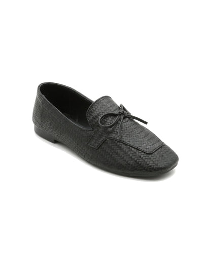 TKN Camille black woven-effect loafer with a tonal bow and piped vamp panel — alternate front three-quarter view.