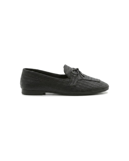 TKN Camille black woven-effect loafer with a tonal bow and piped vamp panel — alternate side view.
