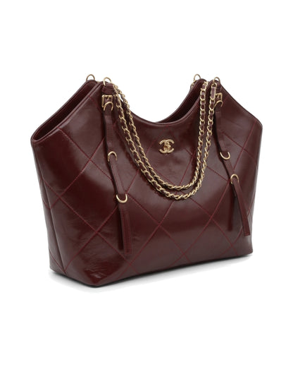 TKN Cascade — Burgundy — dipped top outline — front three-quarter view