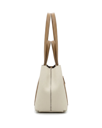 TKN Compass — Cream / Tan — squared front silhouette — side profile.