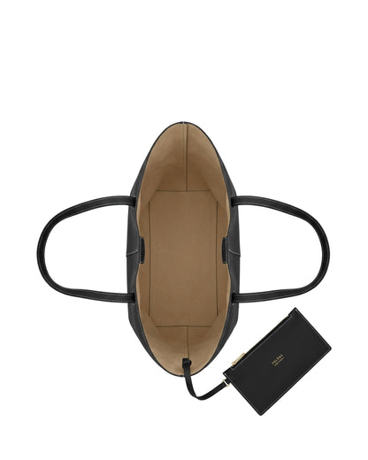 TKN Contour — Black — angular lower silhouette — overhead view