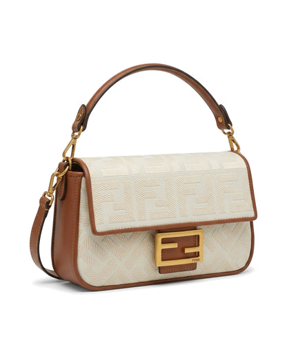 TKN Frame — Cream / Tan — rectangular flap silhouette — front three-quarter view
