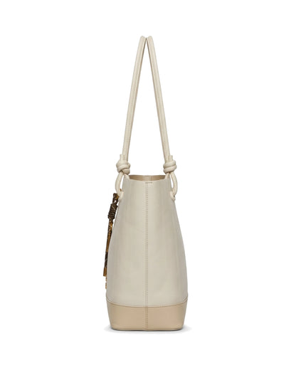 TKN Halo — Cream — upright tote body — side profile.