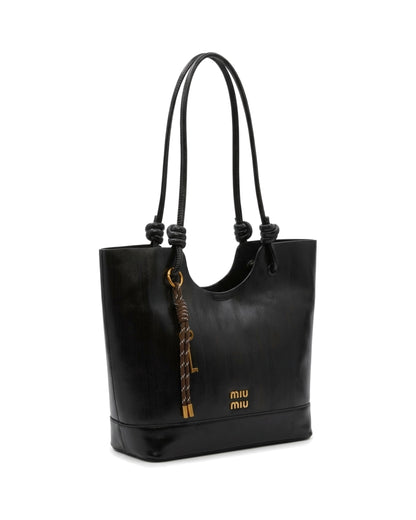 TKN Halo — Black — upright tote body — front three-quarter view.