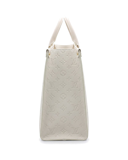 TKN Imprint — Cream — broad structured-looking tote body — side profile.