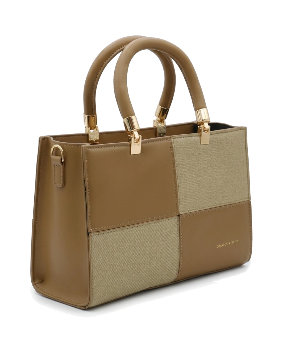 TKN Mosaic — Tan / Beige — square-looking structured silhouette — front three-quarter view.