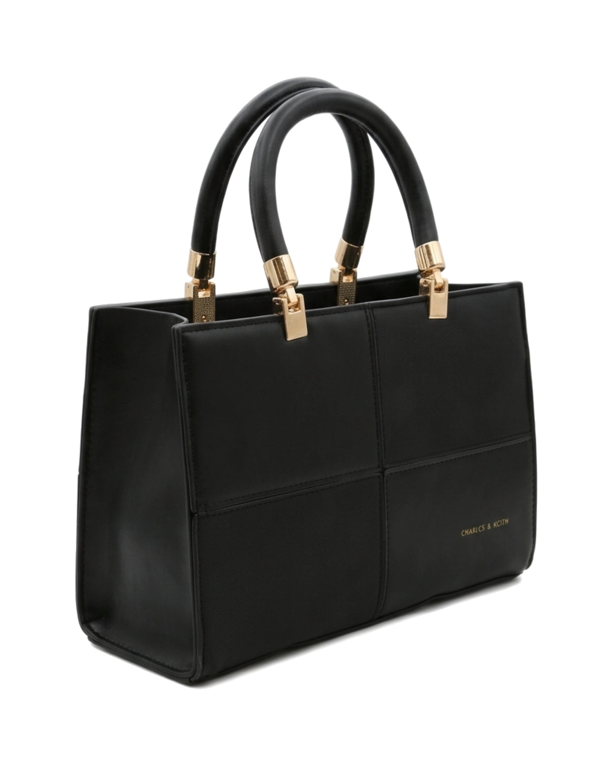 TKN Mosaic — Black — square-looking structured silhouette — front three-quarter view.