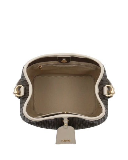 TKN Nest — Black / Cream — rounded bucket silhouette — overhead view.
