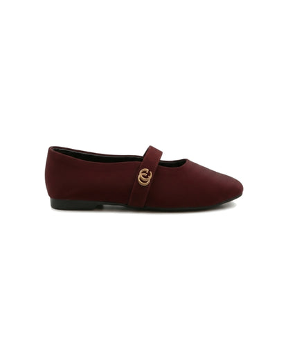 TKN Noelle burgundy matte Mary Jane flat with a rounded toe and gold-tone interlocking ring detail — side view.