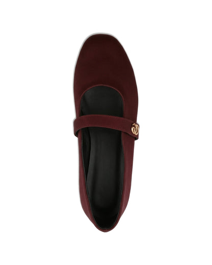 TKN Noelle burgundy matte Mary Jane flat with a rounded toe and gold-tone interlocking ring detail — top view.