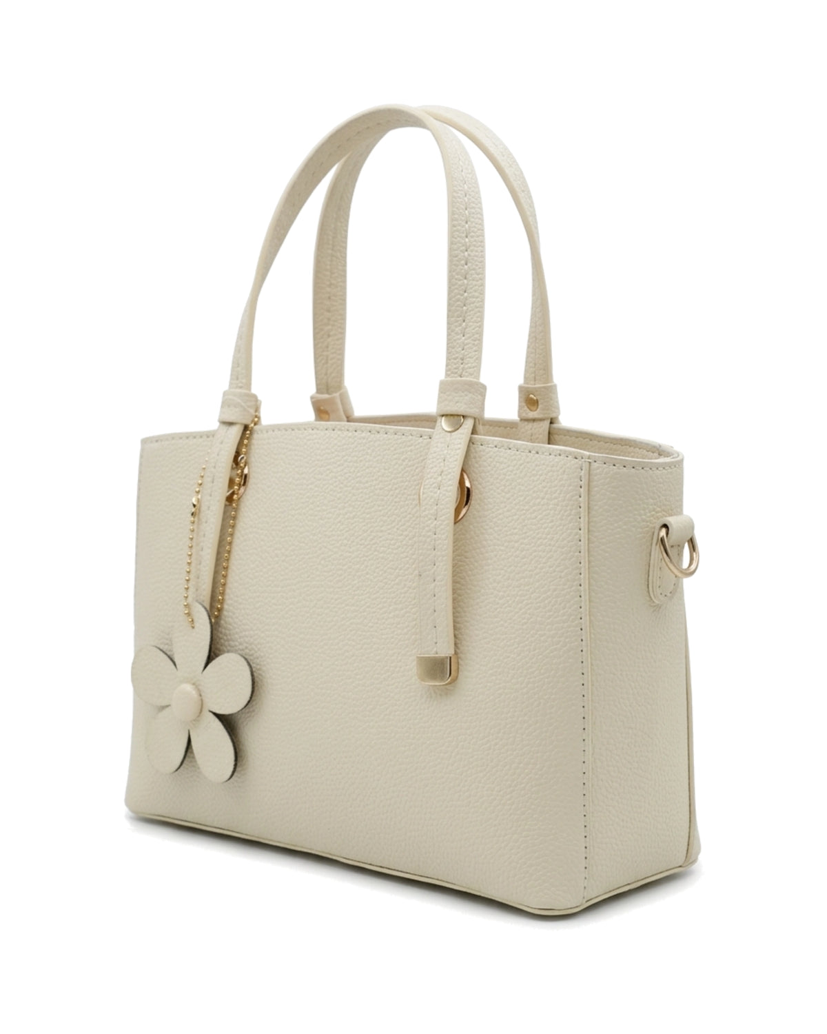 بيتال من TKN — كريمي — جسم مستطيل بفتحة سوستة — زاوية أمامية مائلة.