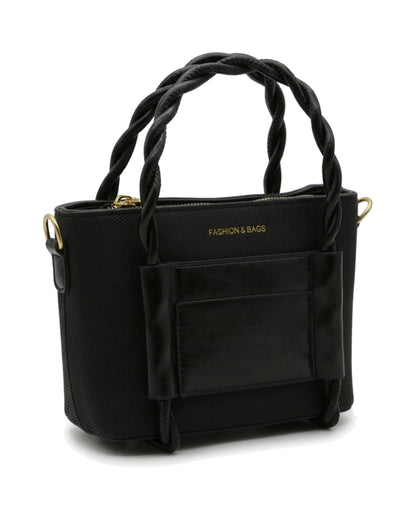 TKN Twist — Black — upright tote silhouette — front three-quarter view.