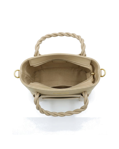 TKN Twist — Beige — upright tote silhouette — overhead view.